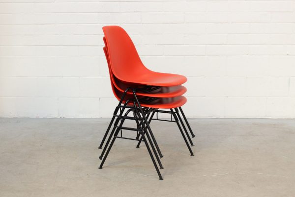 Eames DSS red Stack office chairs